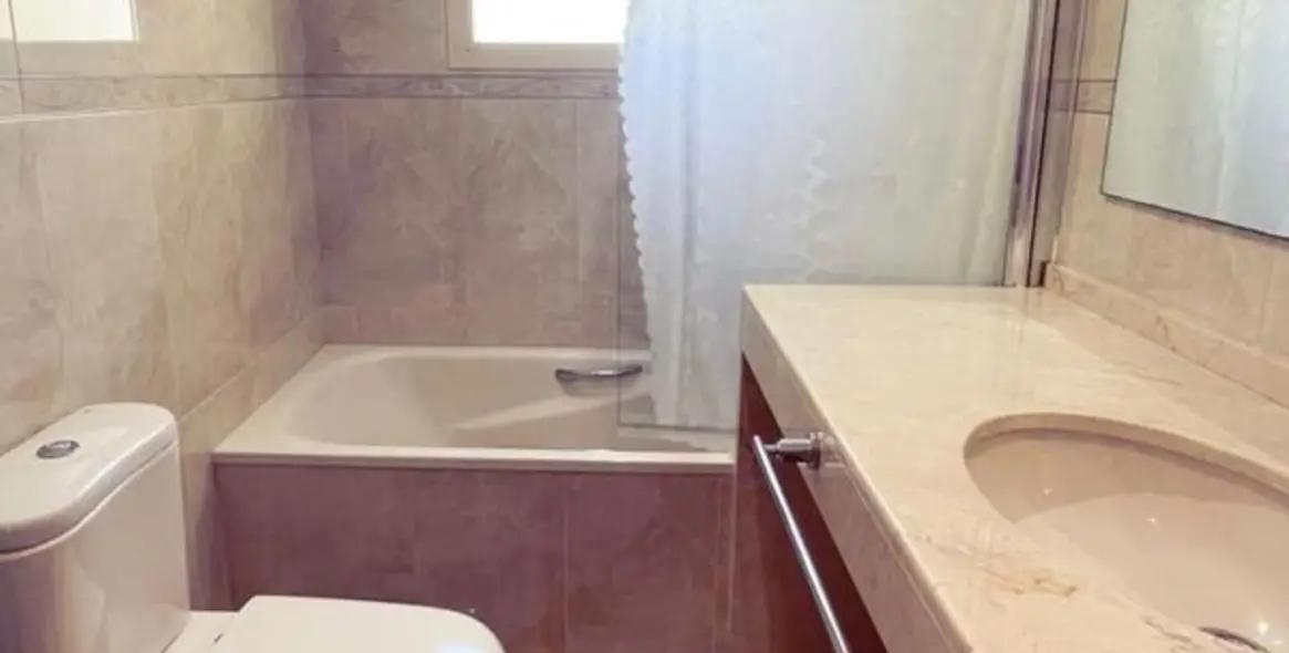 Sale of middle floor apartment in Mijas Costa 12