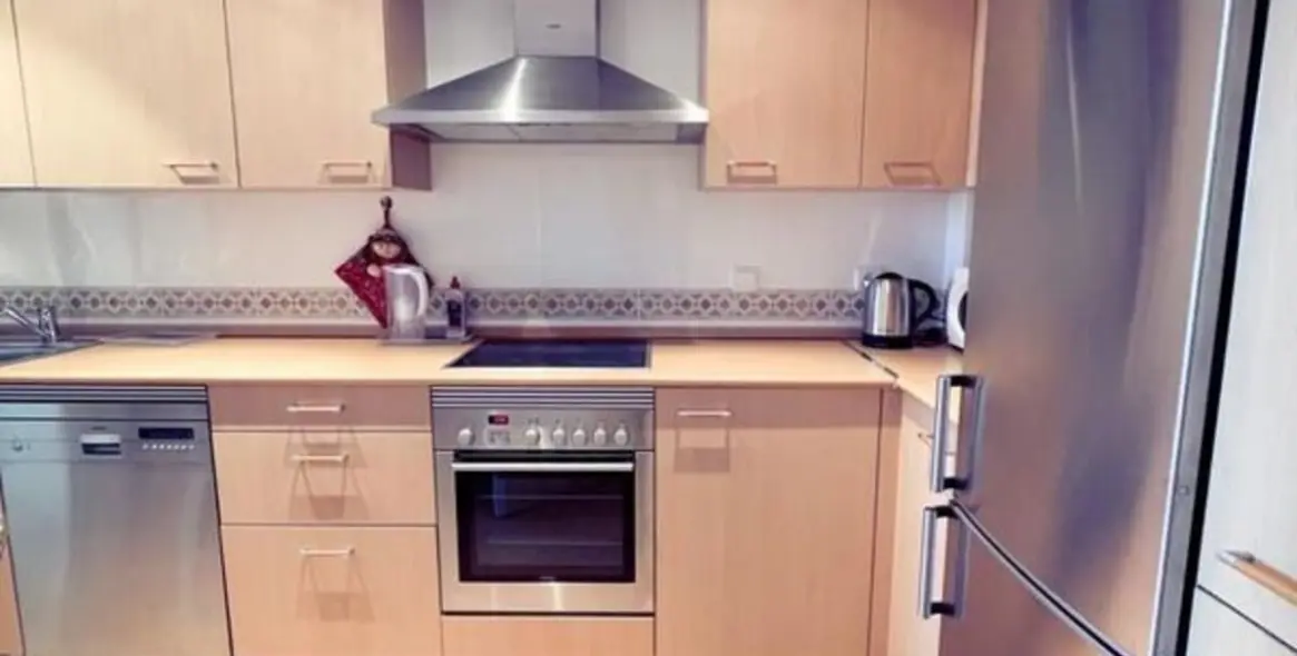 Sale of middle floor apartment in Mijas Costa 13