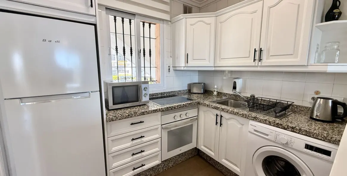 Venta de apartamento en planta media en Riviera del Sol 10