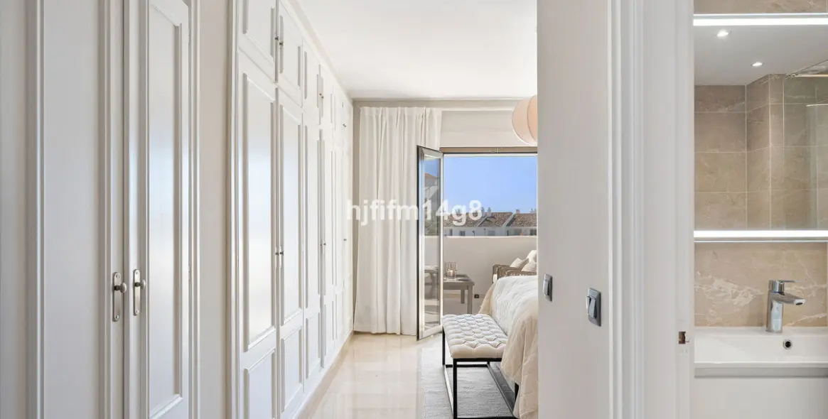 Sale of middle floor apartment in Nueva Andalucía 13