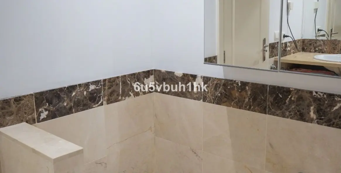 Sale of ground floor apartment in Mijas Costa 34