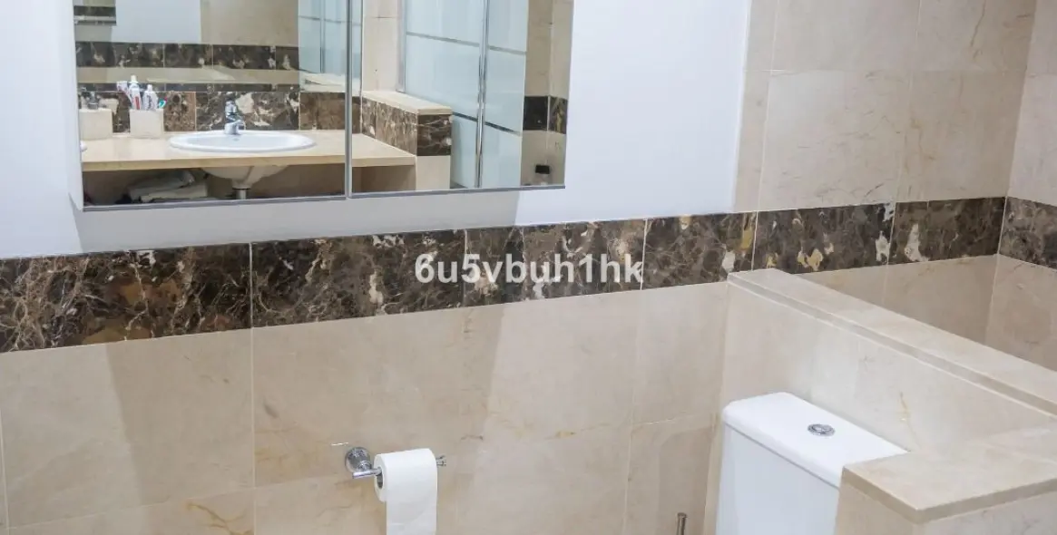 Sale of ground floor apartment in Mijas Costa 48