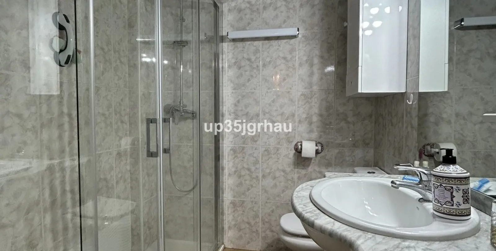 Продажа апартаментов на среднем этаже в Estepona 9