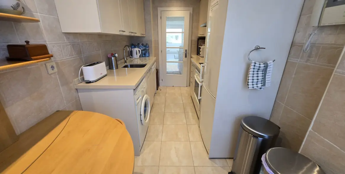 Venta de apartamento en planta media en The Golden Mile 21