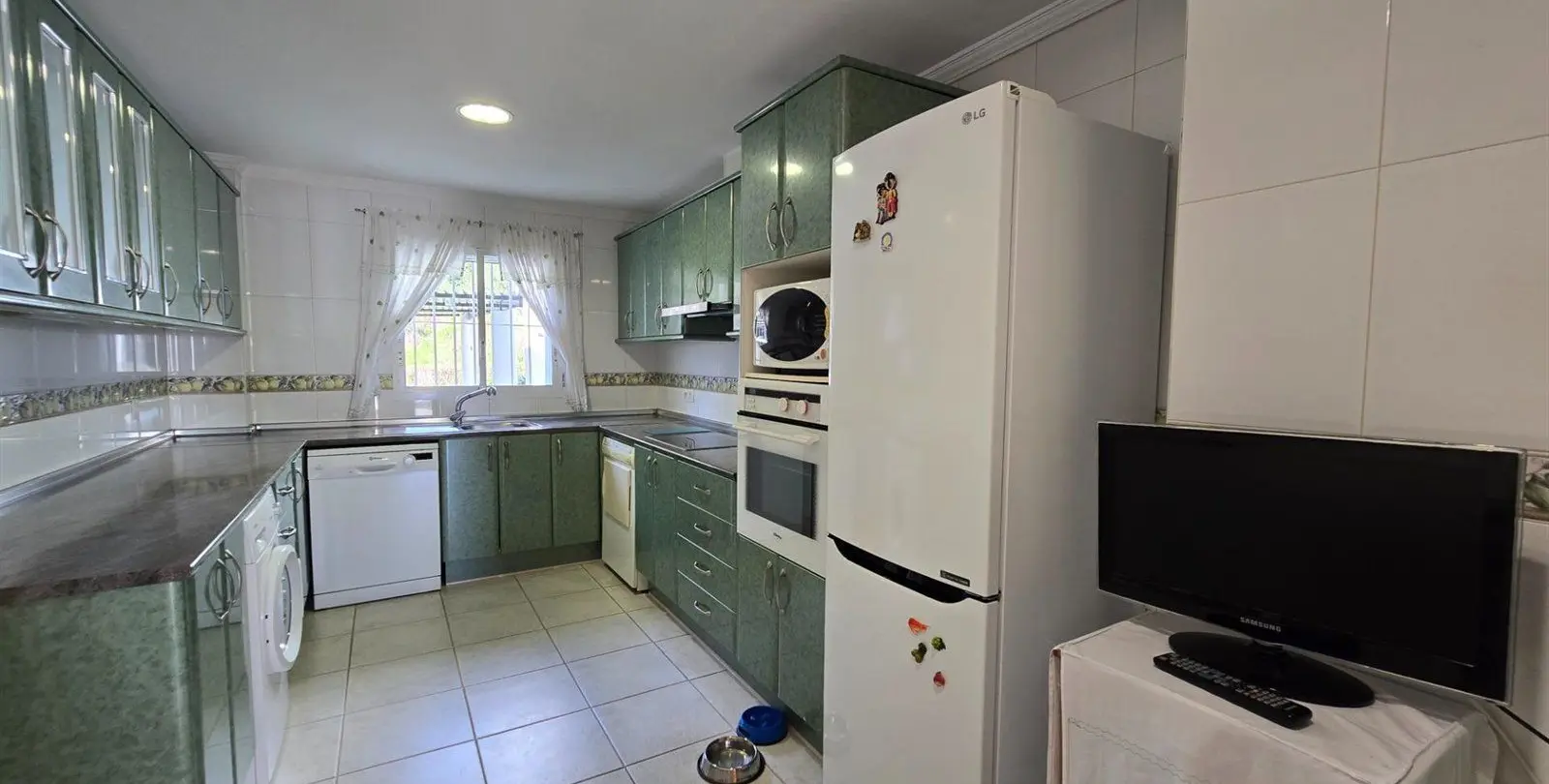 Venta de apartamento en planta baja en La Quinta 23
