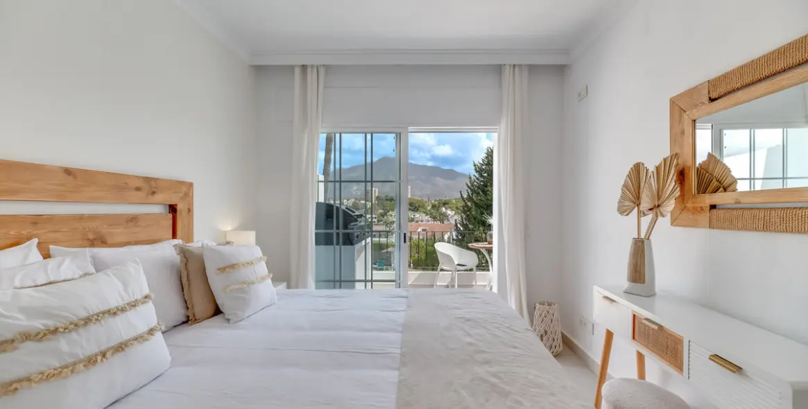 Alquiler a corto plazo de apartamento en planta media en Nueva Andalucía 14