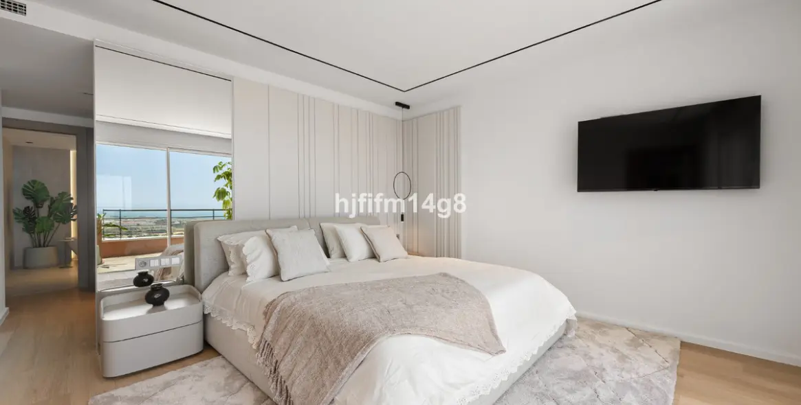 Venta de apartamento en planta media en Nueva Andalucía 13