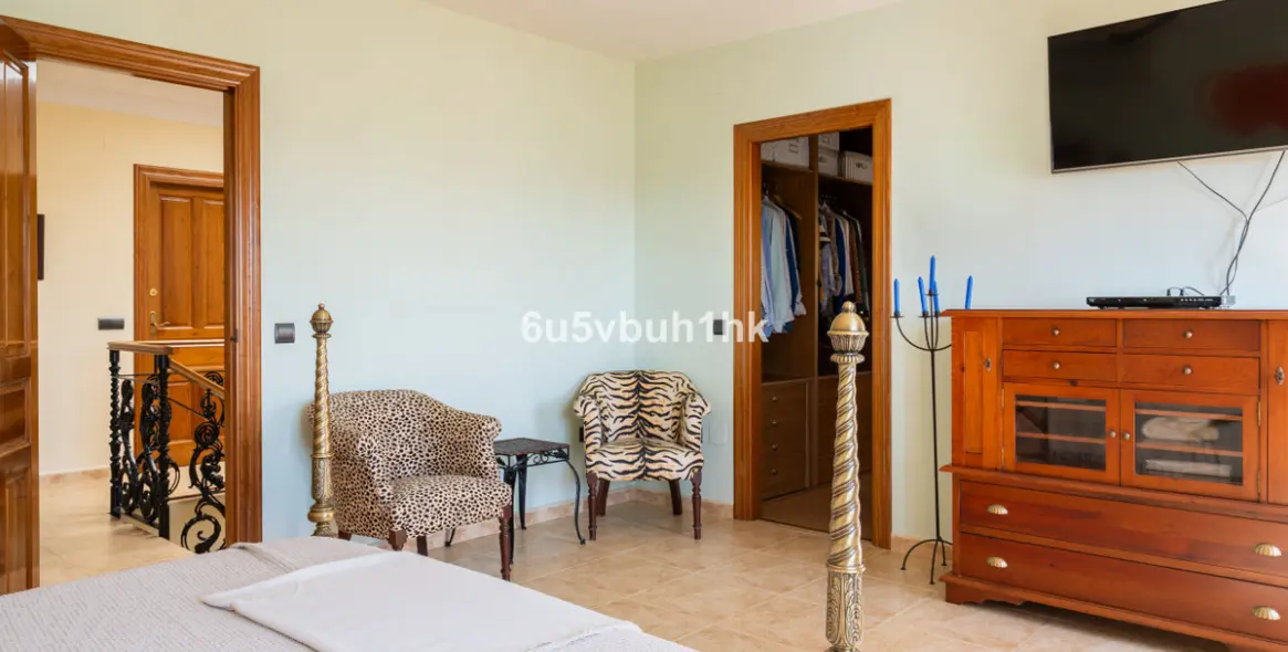 Venta de villa independiente en El Coto 26