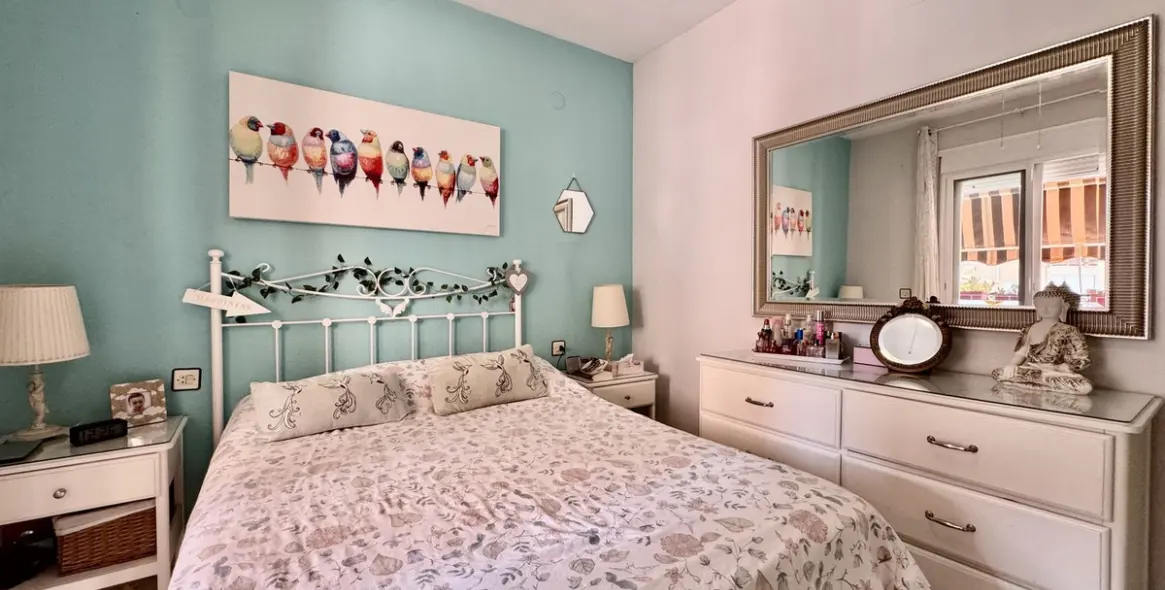 Venta de apartamento en planta media en Los Boliches 14
