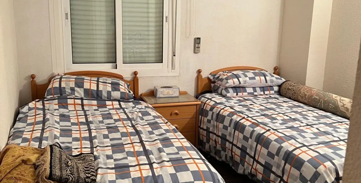 Venta de apartamento en planta media en Los Boliches 12