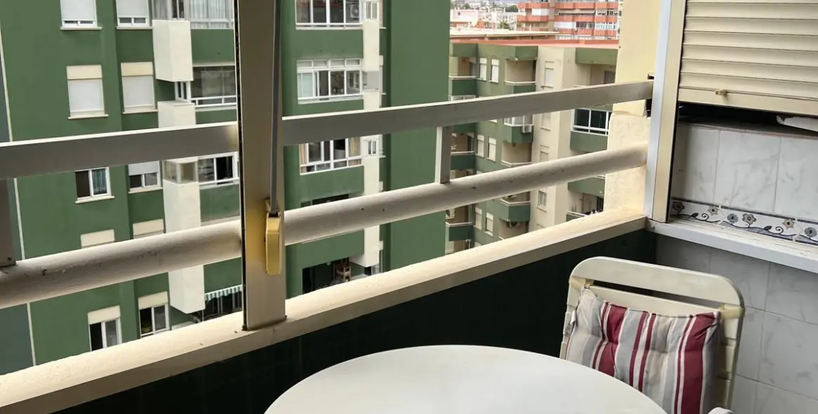 Venta de apartamento en planta media en Los Boliches 14