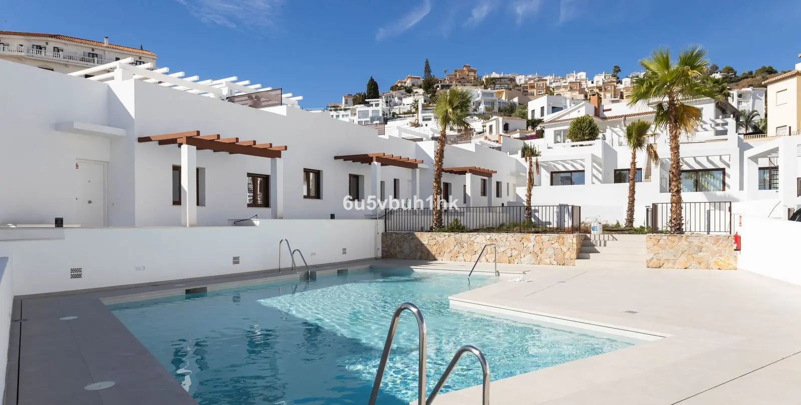 Продажа двухуровневых апартаментов в Nerja 38