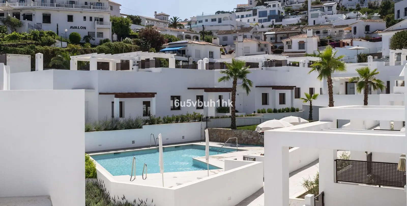 Продажа двухуровневых апартаментов в Nerja 42