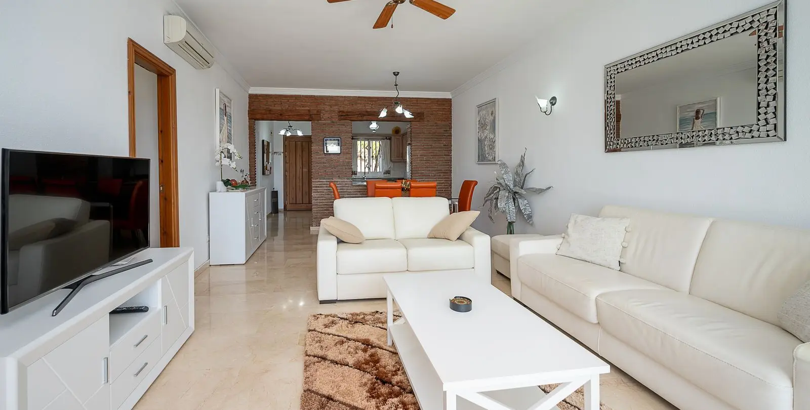 Продажа апартаментов на первом этаже в Mijas Costa 10